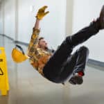 Worker Falling on Wet Floor