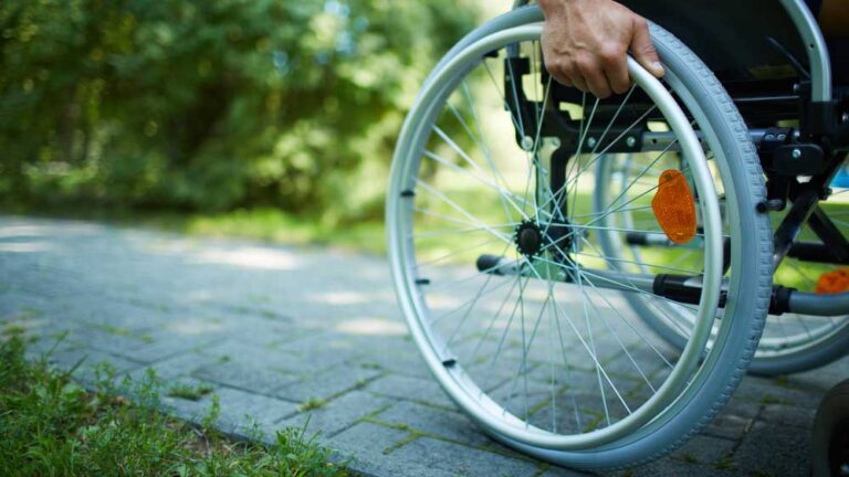 A man in a wheel chair.