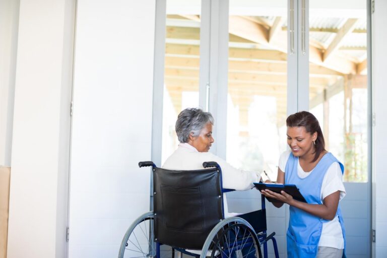 disability senior woman with doctor