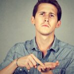 man asking for more money to pay back debt