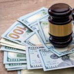 Gavel on hundred dollar bills_s