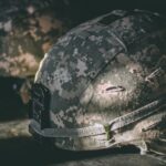 worn military helmets_u