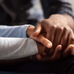 A couple holding hands_s