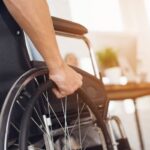 Person in a wheel chair low angle_s