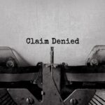 claim denied on a typewriter_S
