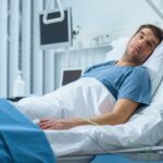 Young man in a hospital bed_s