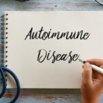 Autoimmune disease written on a doctor’s pad_s