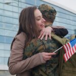 Woman hugging soldier_s