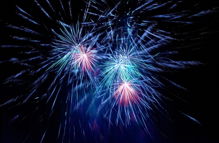 Colorful fireworks on the black sky background