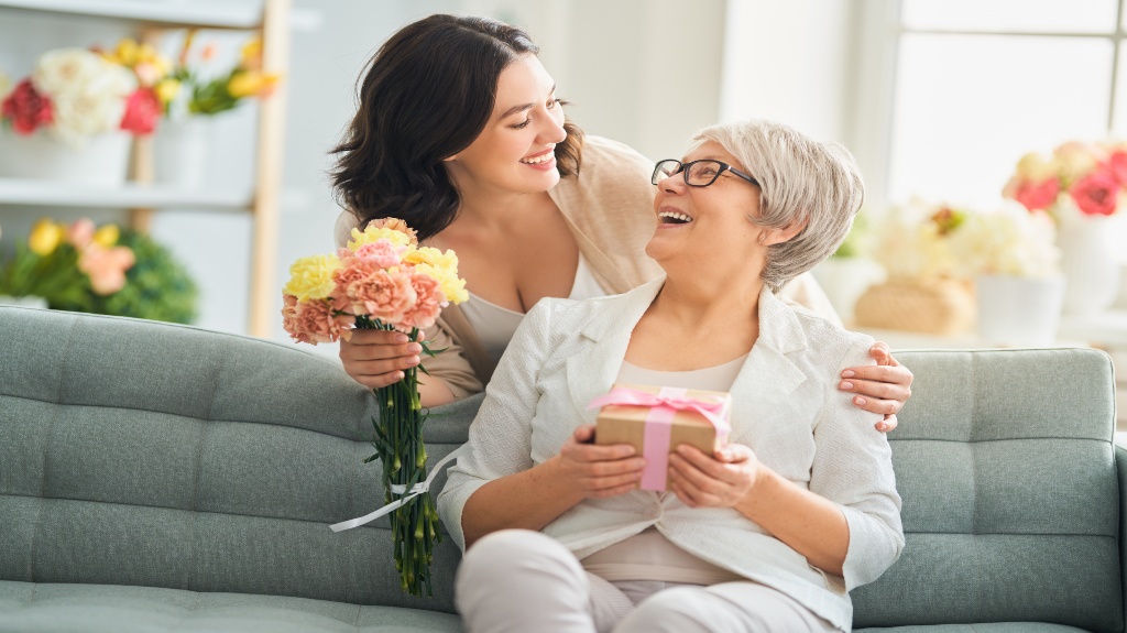 mother and daughter with flowers