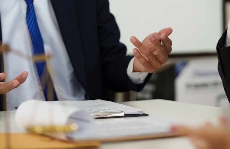 Lawyer is speaking with client