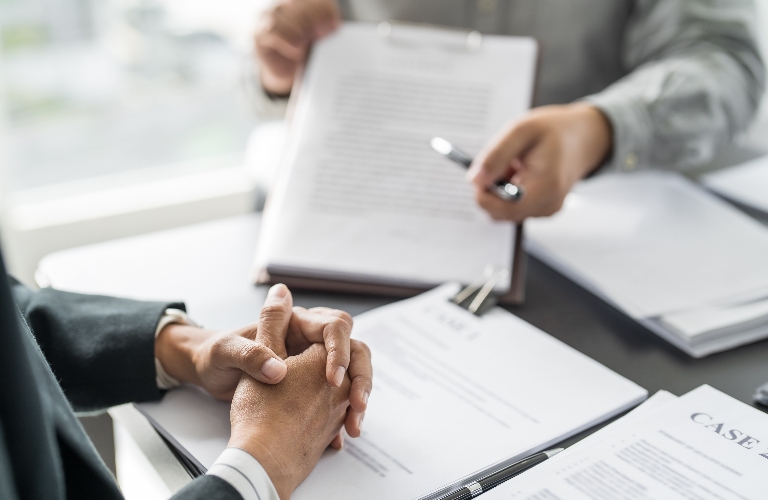 client is speaking with lawyer
