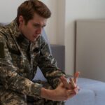 middle aged sad, desperate military man looking thoughtful_s