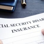 Man is holding Social Security Disability Insurance_s