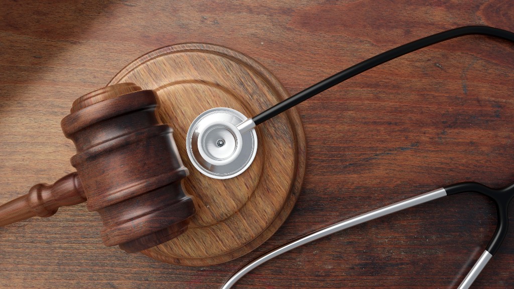 Judge's gavel and stethoscope