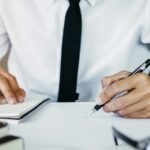 Man is reviewing documents_s