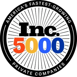 Round black and white emblem with text "America's Fastest-Growing Private Companies" and colorful "Inc. 5000" logo.