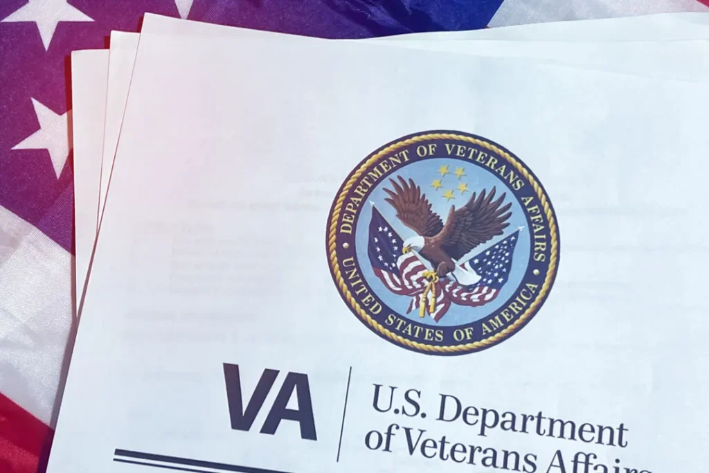 Official U.S. Department of Veterans Affairs letterhead with eagle emblem and American flag background.